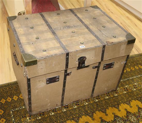 Bick and Son, Cheltenham. A late 19th century canvas covered tin trunk